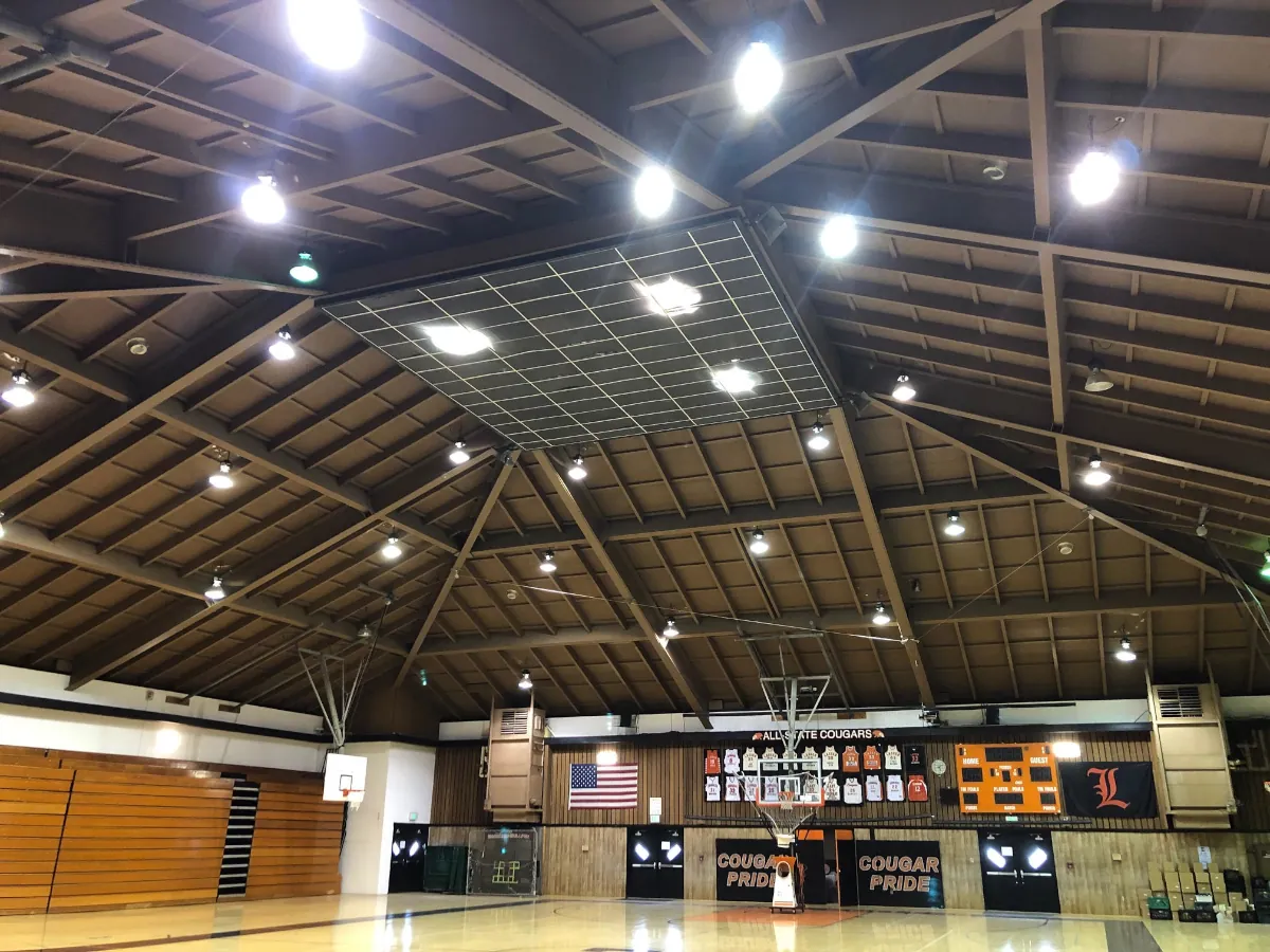 Lassen Community College gymnasium with aging metal halide lighting before LED retrofit
